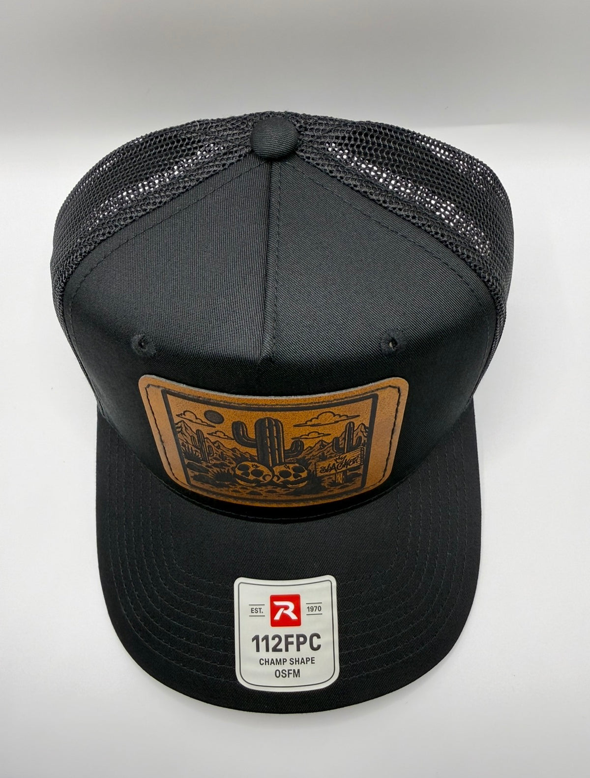 Deserted leather patch curved bill snapback
