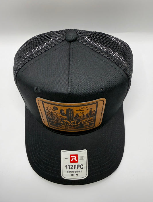 Deserted leather patch curved bill snapback